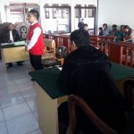 Boy Edward Sijono Ramchie mendengar putusan majelis hakim