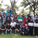 Aktivis HMI Cabang Sorong berpose bersama usai melakukan penggalan dana / (foto: Said Andika)