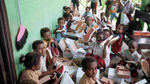 Telkomsel Salurkan Ratusan Sepatu Sekolah Hasil Donasi Pelanggan
